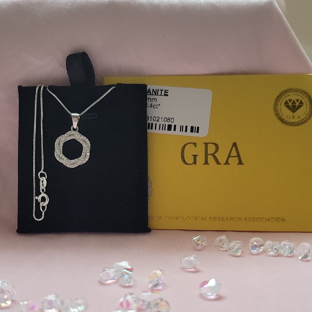 Moissenite and Sterling Silver Necklace. Comes With Certificate.